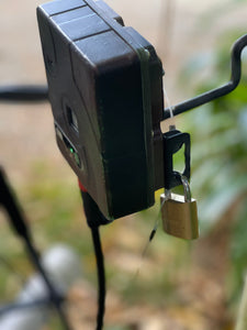 DOC AI Cam secured with a padlock